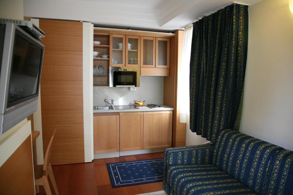 Aparthotel England Риччоне Номер фото